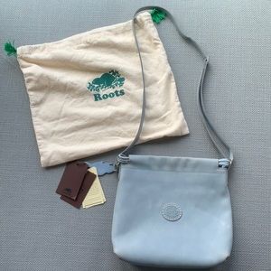 Roots cross body bag